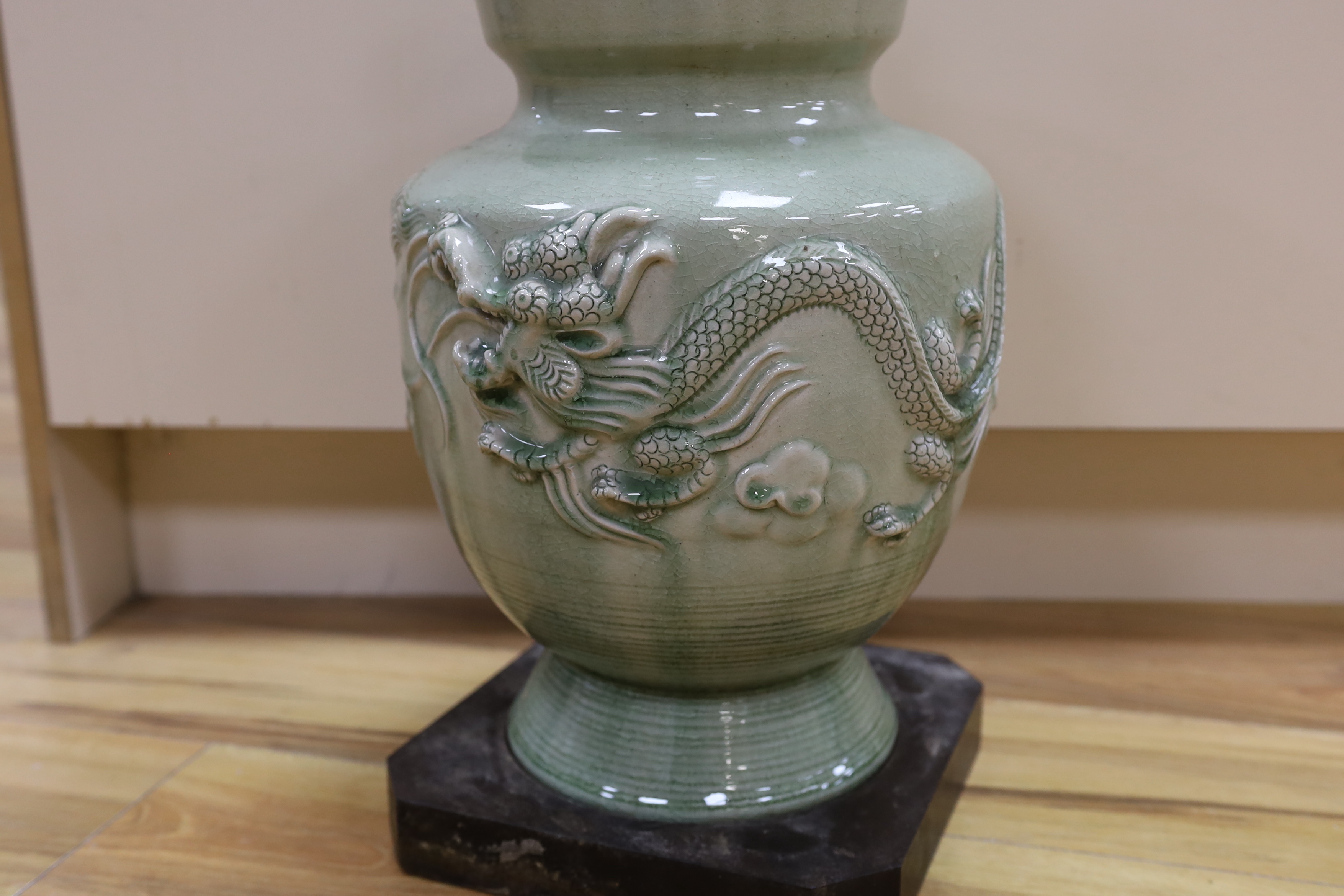 A Chinese celadon glazed lamp, 55cm high